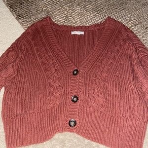 Brownish purple cover sweater buttons